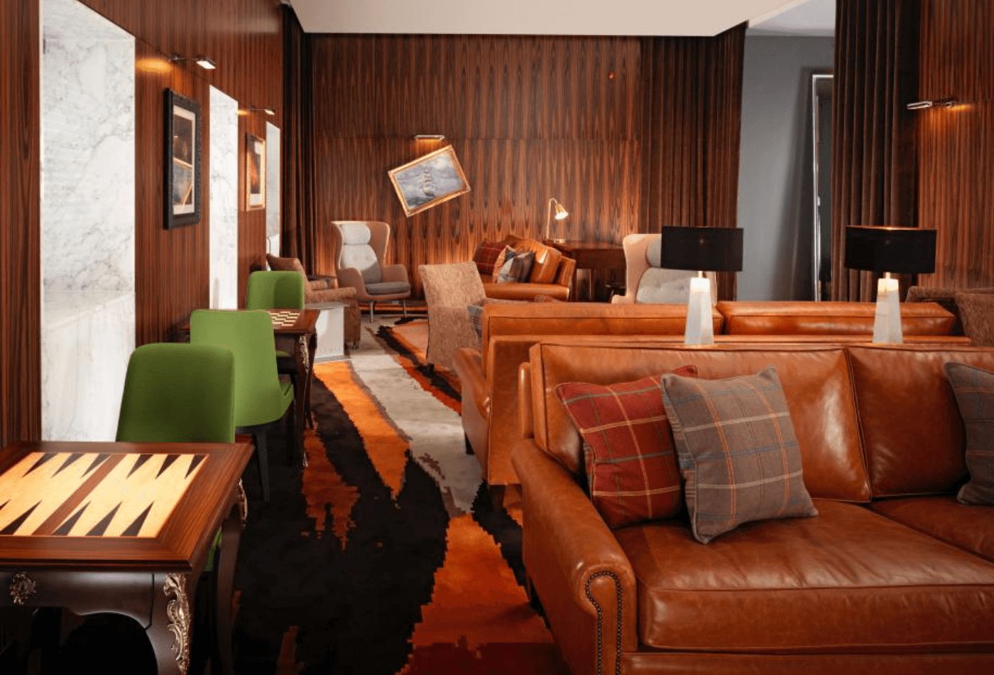 Lounge with orange, green and brown furniture.jpg