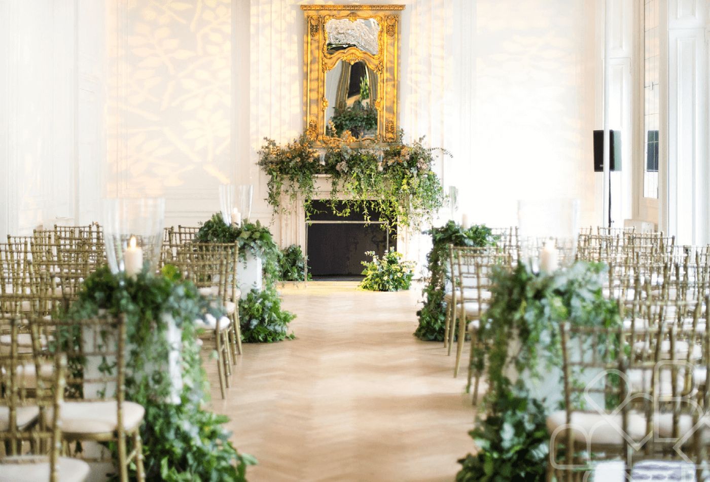 White wedding with green floral arrangements.jpg